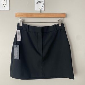 Aritzia | Black Chisel skirt -size 4